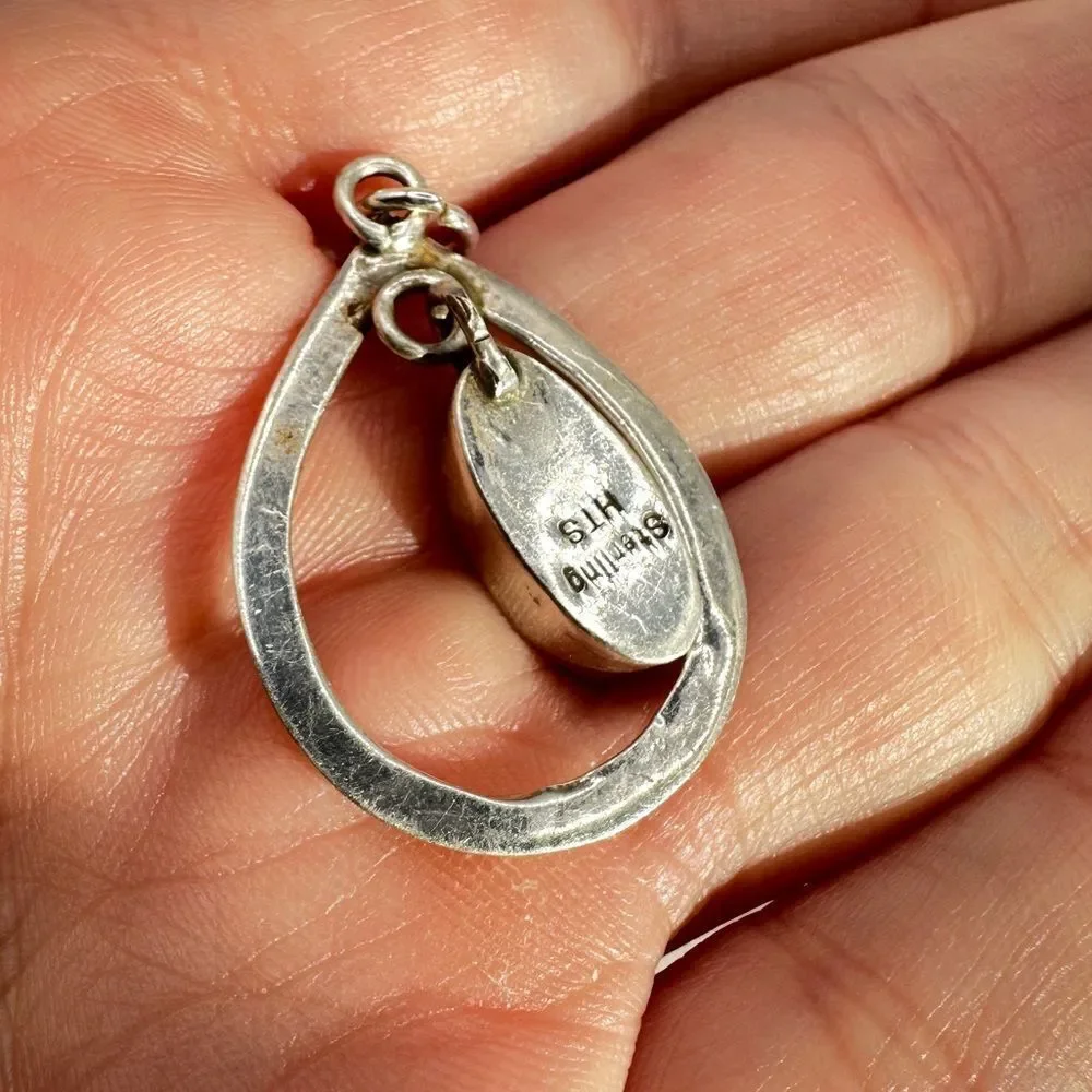 Marked Sterling‎ silver (HTS) and opal in resin pendant!